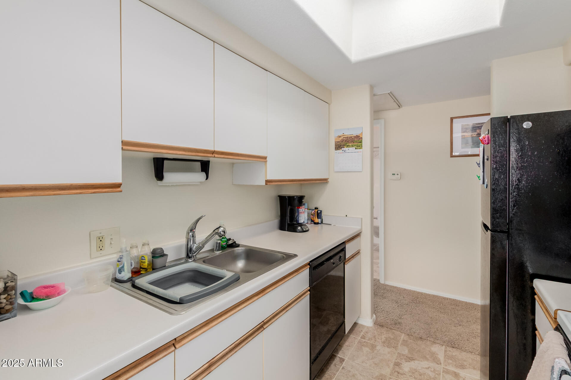 3434 East Baseline Road, Unit 246 Phoenix, AZ 85042 - Photo 12 of 43 a kitchen with stainless steel appliances a sink dishwasher stove and refrigerator