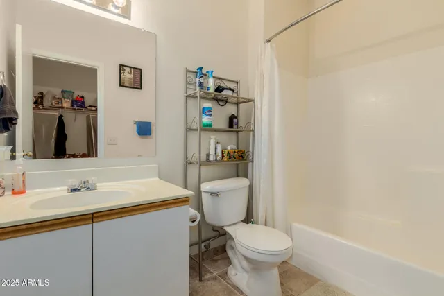 a bathroom with a sink toilet and a bathtub