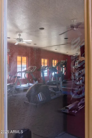 a view of an outdoor sitting area with furniture