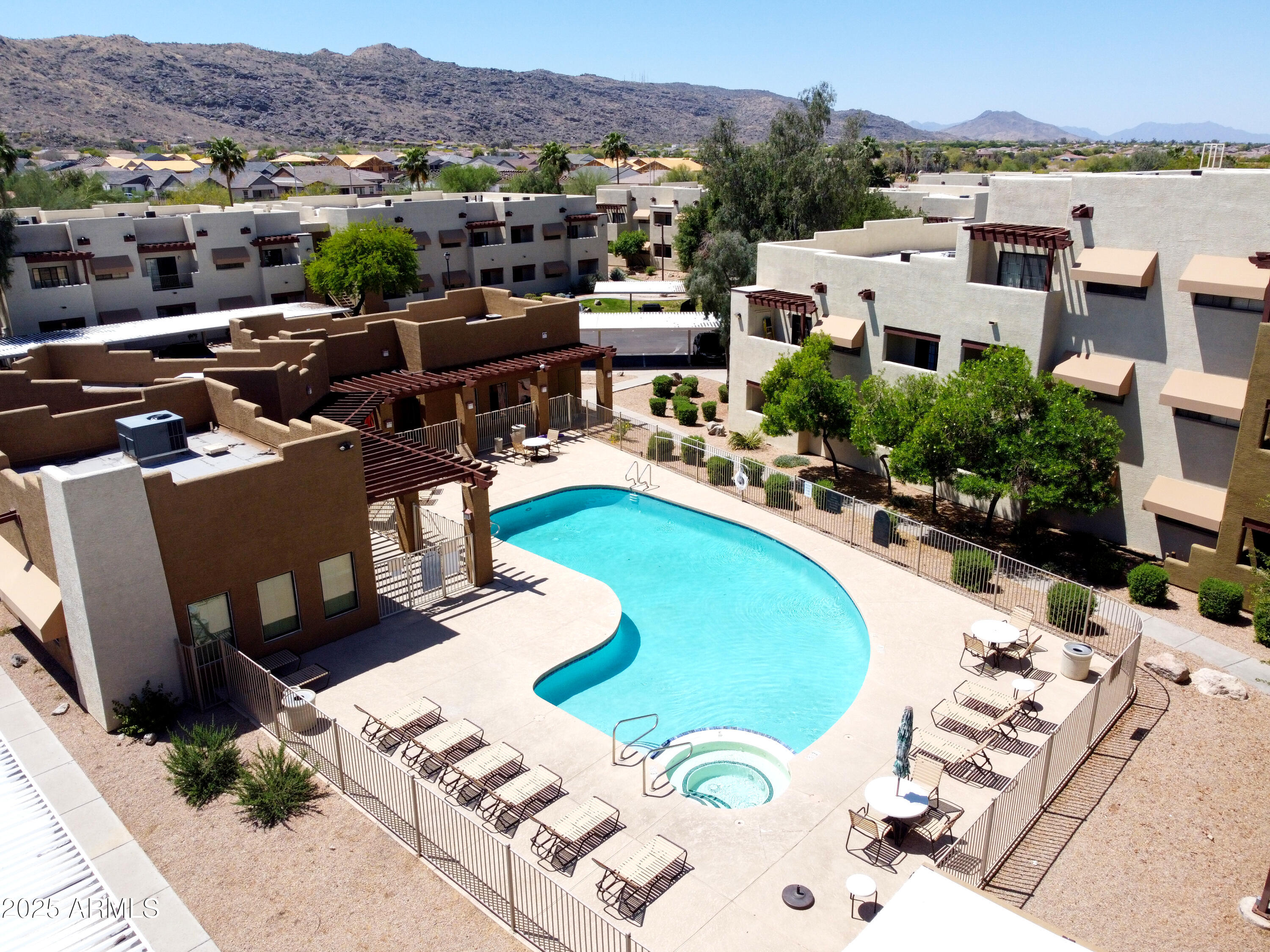 3434 East Baseline Road, Unit 246 Phoenix, AZ 85042 - Photo 36 of 43 a view of a swimming pool with a patio
