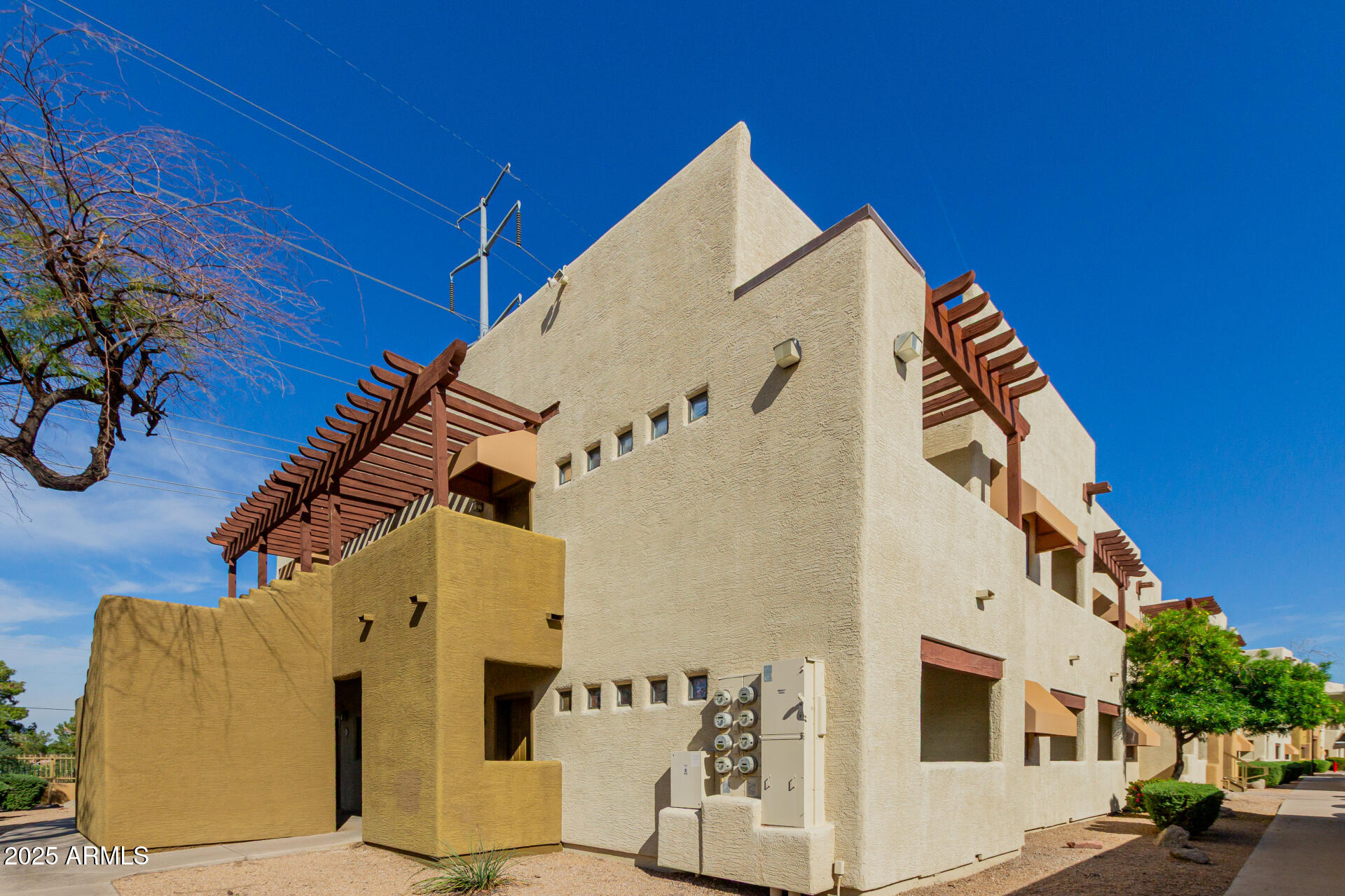 3434 East Baseline Road, Unit 246 Phoenix, AZ 85042 - Photo 4 of 43 a view of a back yard of the house