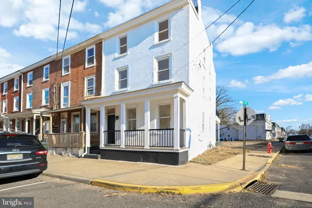 a view of a building with a street