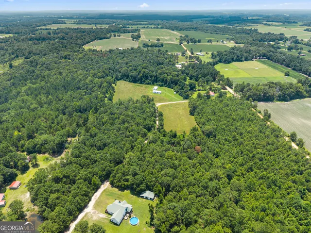 a view of a lake with a yard