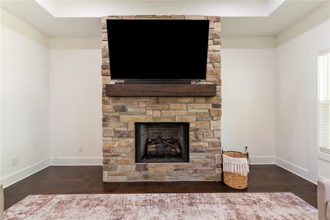 502 Canebrake Drive Anderson, SC 29621 - Photo 9 of 39 This living area features rich wood flooring and a beautiful stone fireplace.