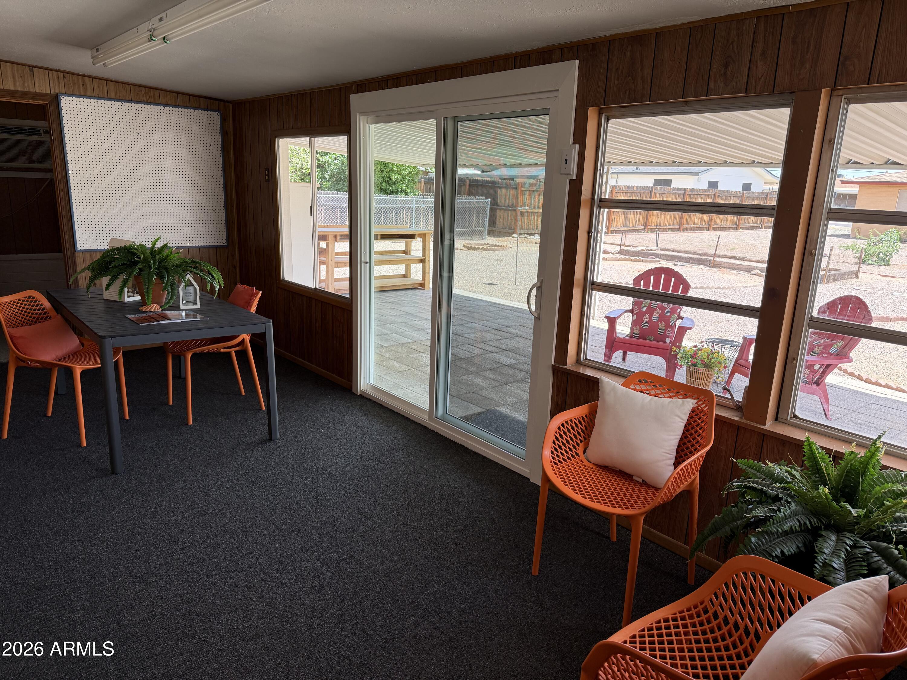 5437 East Butte Street Mesa, AZ 85205 - Photo 20 of 56 a outdoor living space with furniture and a potted plant