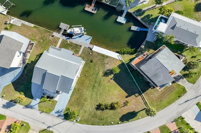 an aerial view of a house with a garden