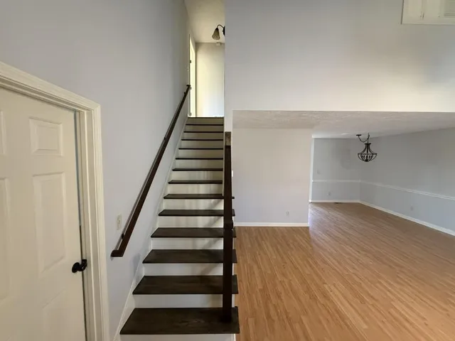 a view of entryway with wooden floor