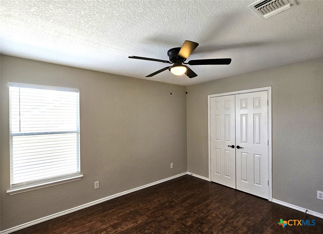 316 Julian Point Cibolo, TX 78108 - Photo 18 of 28 an empty room with a window and a fan