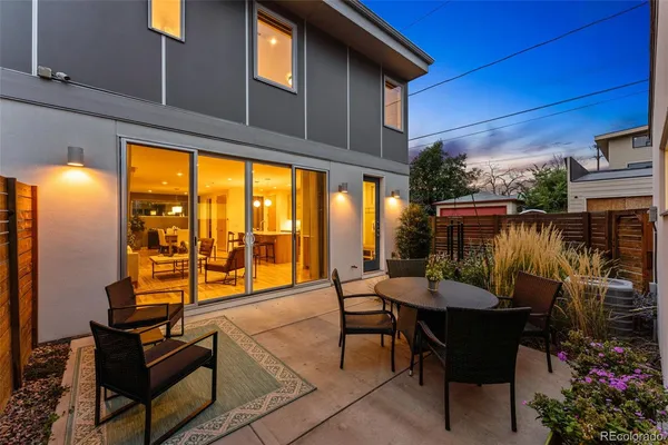 a view of a potted plants on a sidewalk
