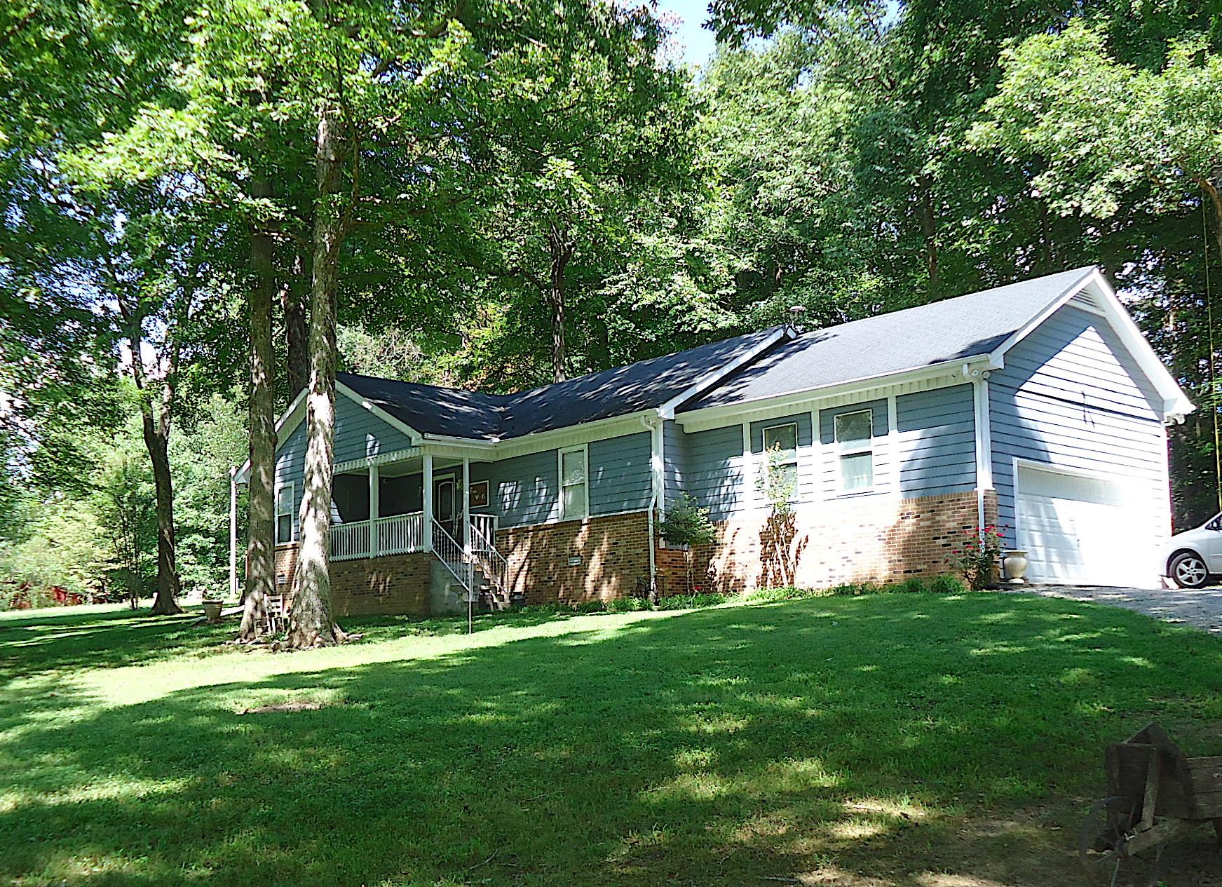 4481 Washington Road Greenbrier, TN 37073 - Photo 1 of 30 a front view of house with yard and green space