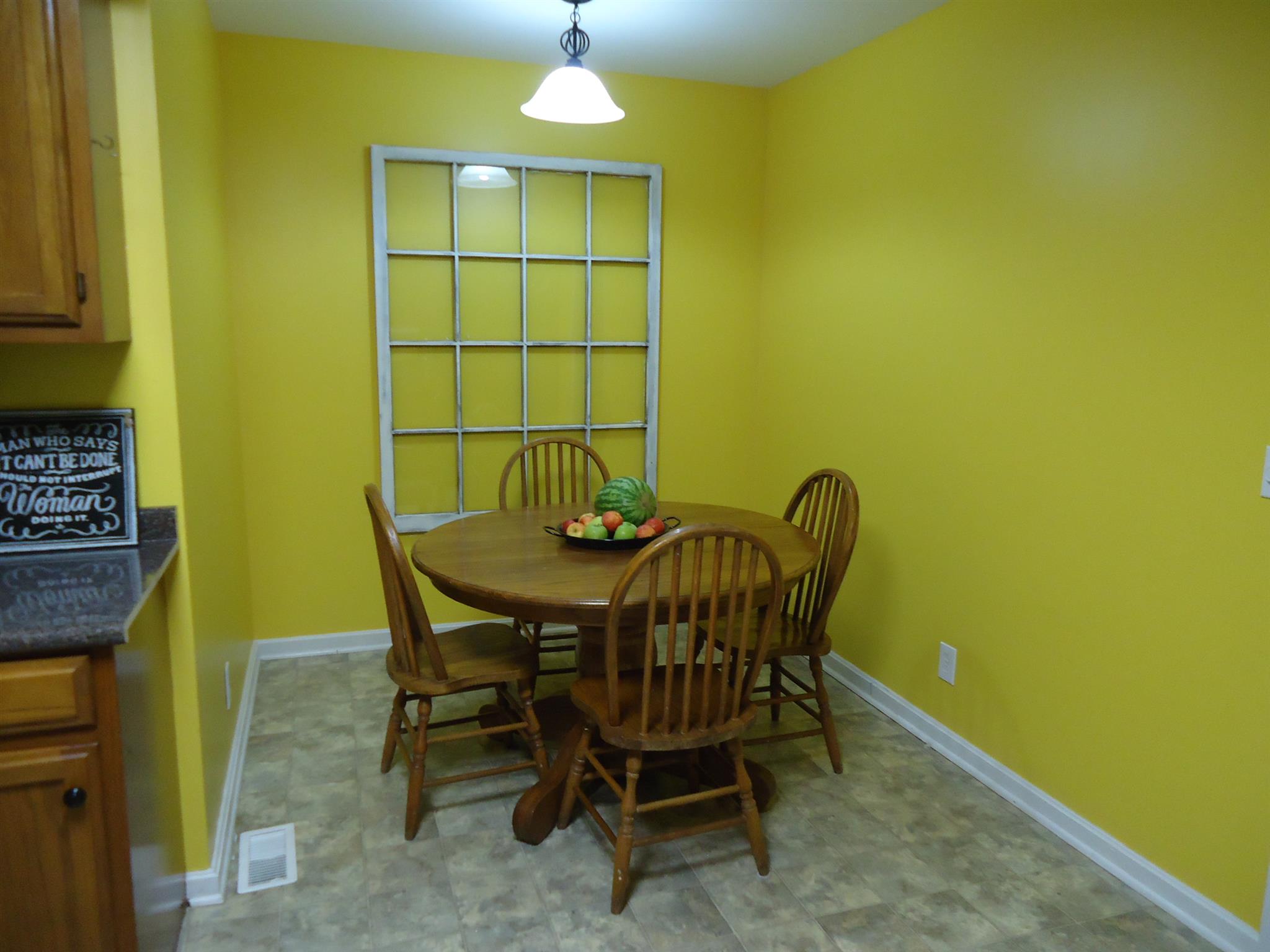 4481 Washington Road Greenbrier, TN 37073 - Photo 11 of 30 a view of a dining room with furniture and chandelier
