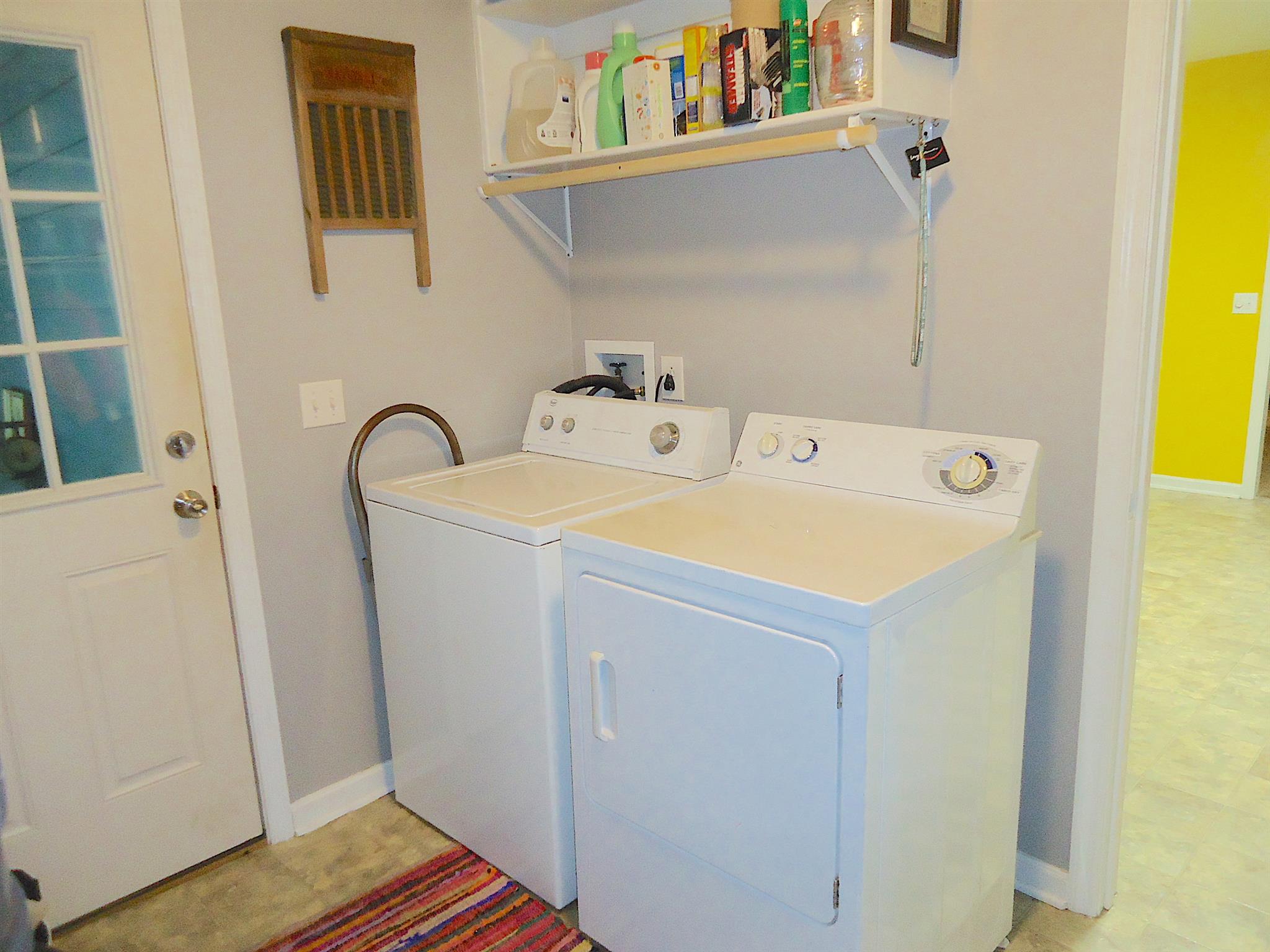 4481 Washington Road Greenbrier, TN 37073 - Photo 12 of 30 a utility room with dryer and washer