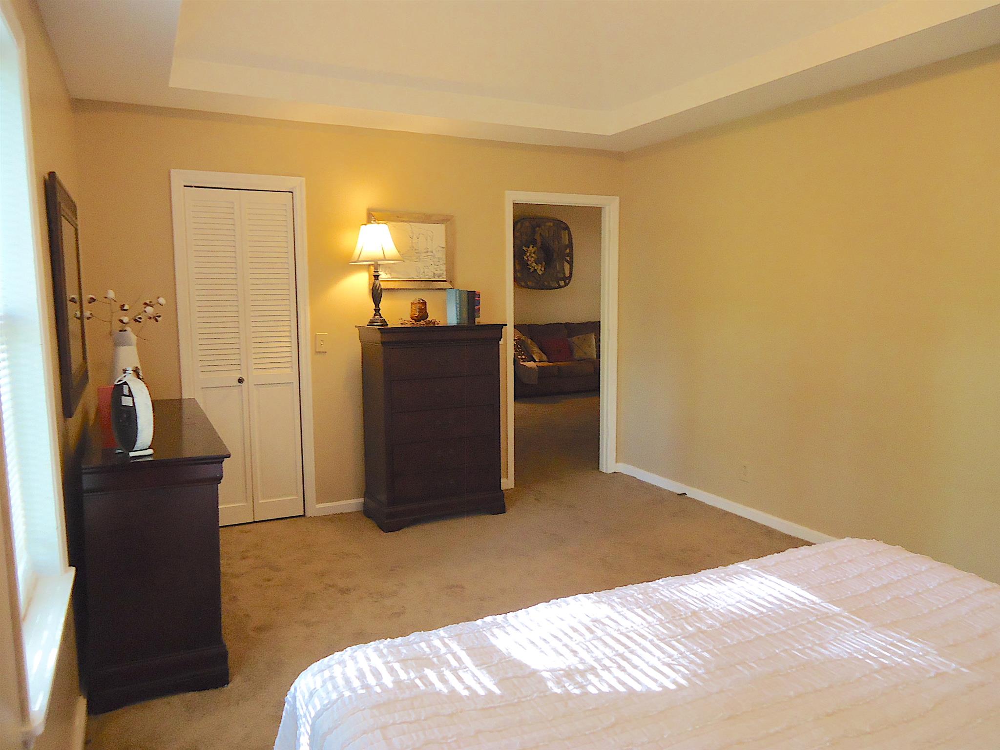 4481 Washington Road Greenbrier, TN 37073 - Photo 16 of 30 a bedroom with a bed and wooden floor