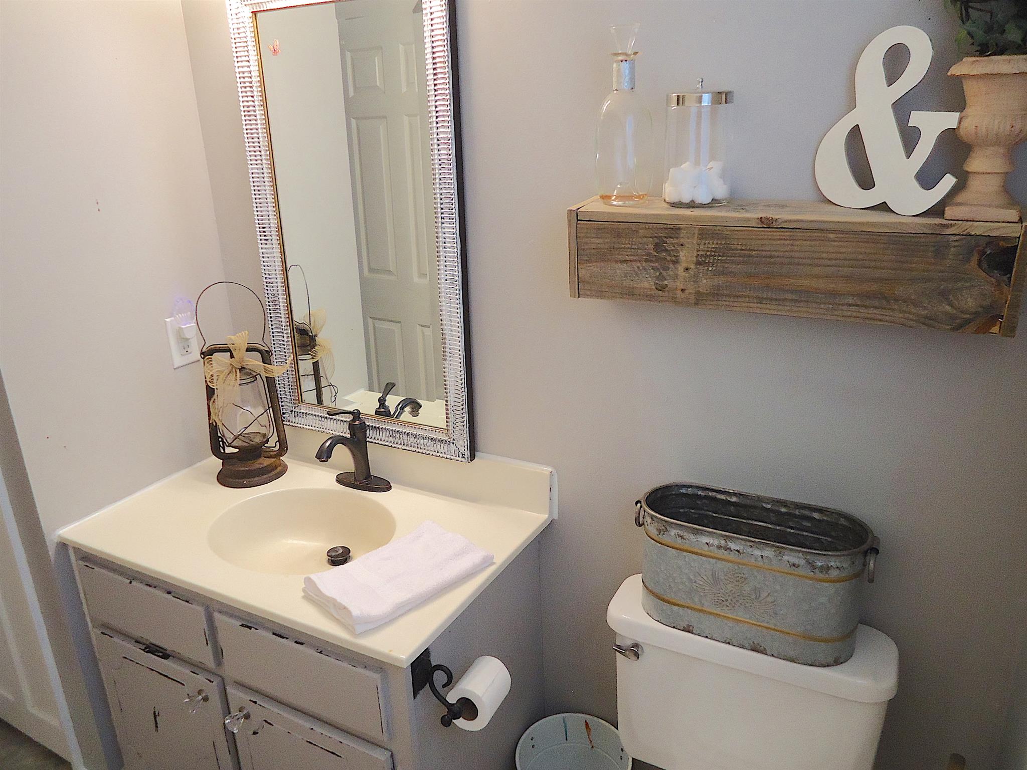 4481 Washington Road Greenbrier, TN 37073 - Photo 21 of 30 a bathroom with a sink and a toilet