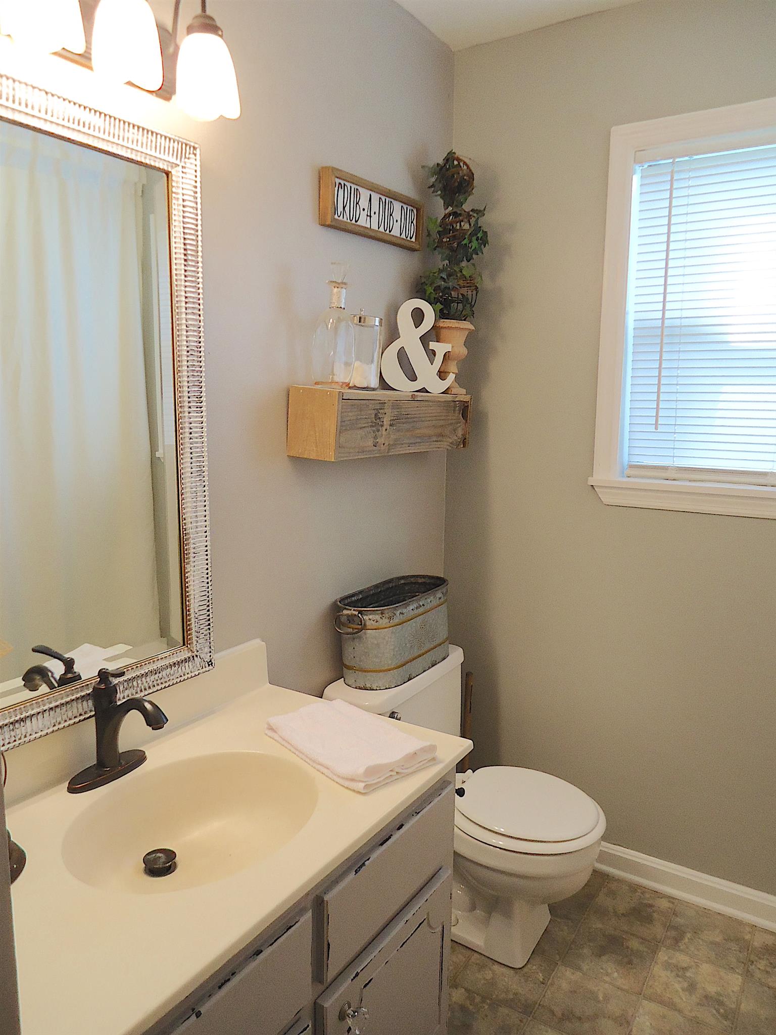 4481 Washington Road Greenbrier, TN 37073 - Photo 22 of 30 a bathroom with a sink and a toilet