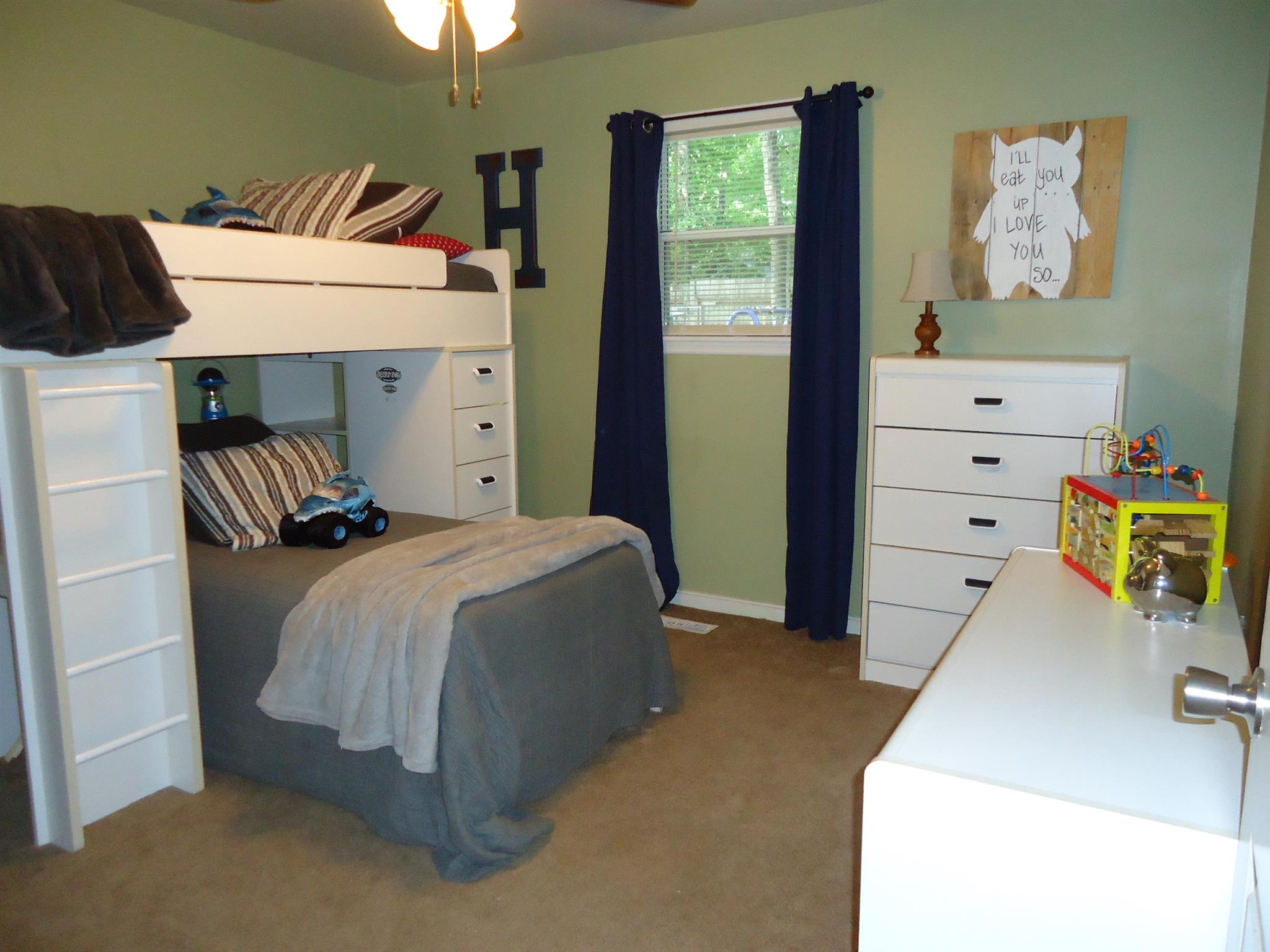 4481 Washington Road Greenbrier, TN 37073 - Photo 23 of 30 a bedroom with a bed and a dresser