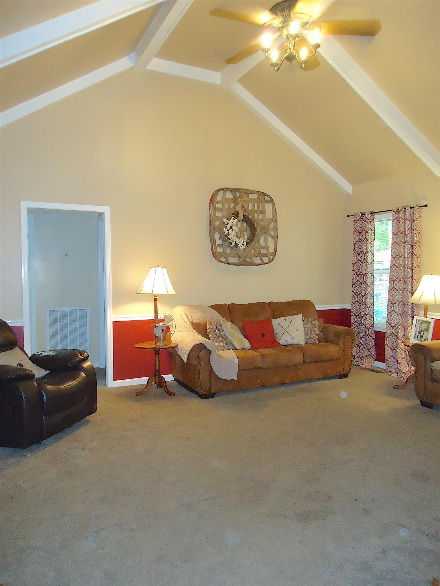 4481 Washington Road Greenbrier, TN 37073 - Photo 5 of 30 a bed room with a bed and a couch