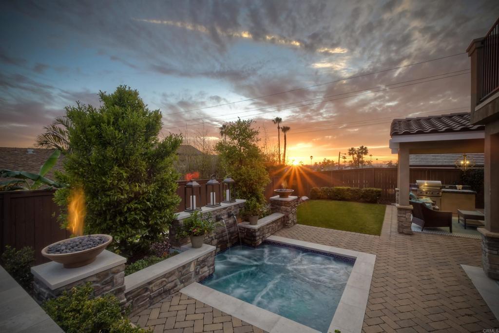 917 Santo Way Cardiff-by-the-Sea, CA 92007 - Photo 28 of 43 a view of a porch with furniture and a fire pit