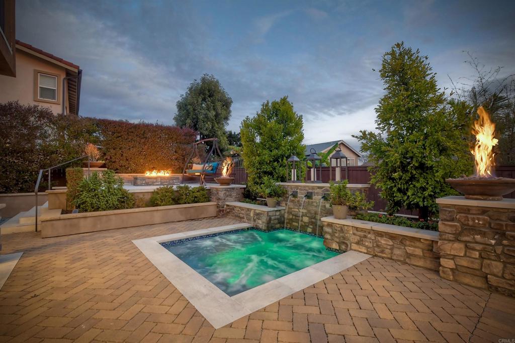 917 Santo Way Cardiff-by-the-Sea, CA 92007 - Photo 32 of 43 a front view of a house with a yard