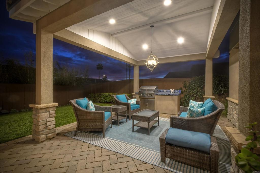 917 Santo Way Cardiff-by-the-Sea, CA 92007 - Photo 34 of 43 a building outdoor space with patio furniture and potted plants