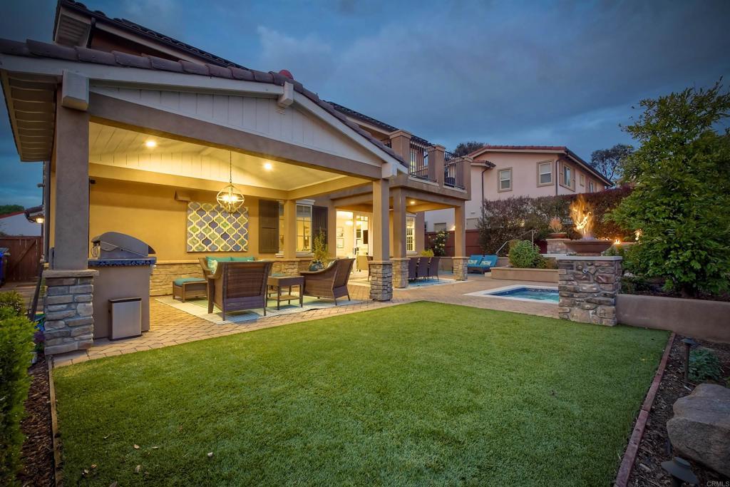 917 Santo Way Cardiff-by-the-Sea, CA 92007 - Photo 36 of 43 a view of a house with a backyard porch and sitting area