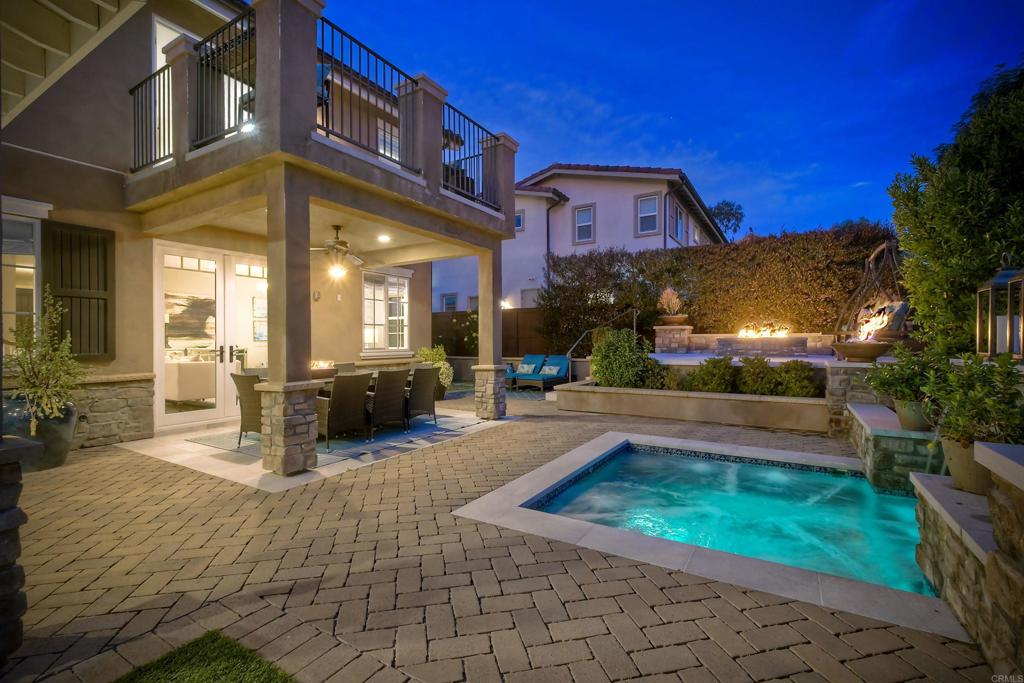 917 Santo Way Cardiff-by-the-Sea, CA 92007 - Photo 37 of 43 a view of a building with a swimming pool