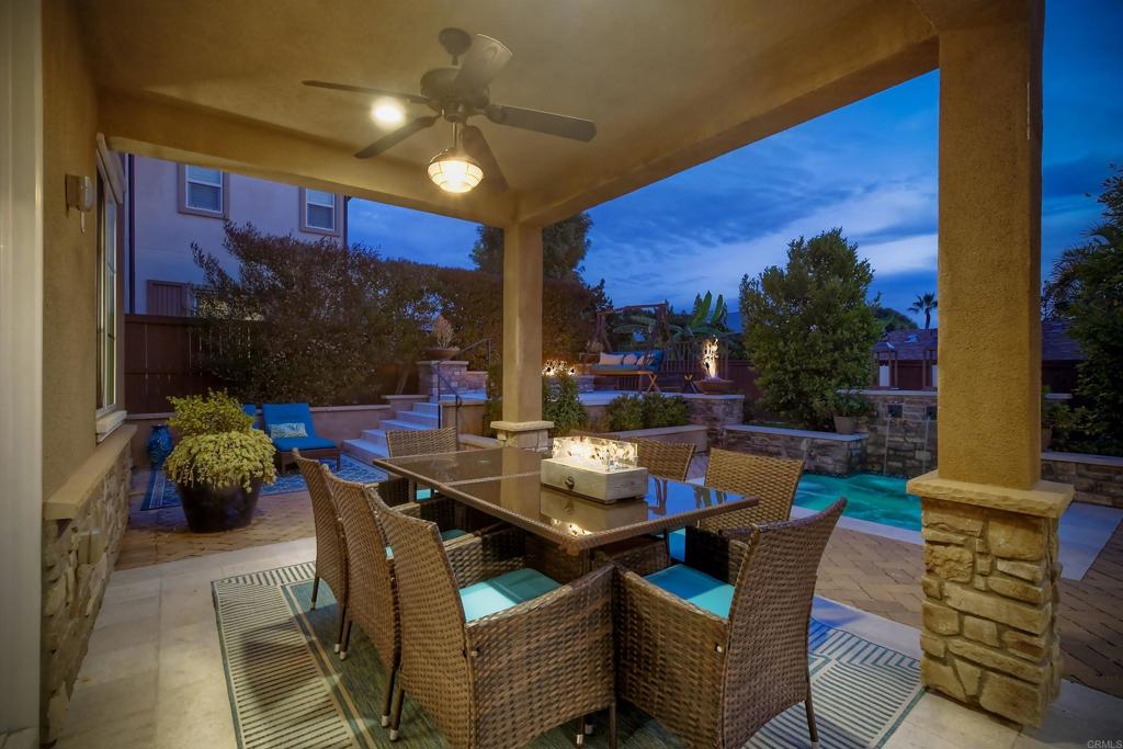 917 Santo Way Cardiff-by-the-Sea, CA 92007 - Photo 38 of 43 a outdoor dining space with furniture and a potted plant