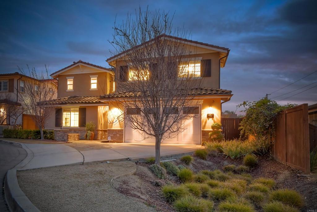 917 Santo Way Cardiff-by-the-Sea, CA 92007 - Photo 43 of 43 a front view of a house with a yard