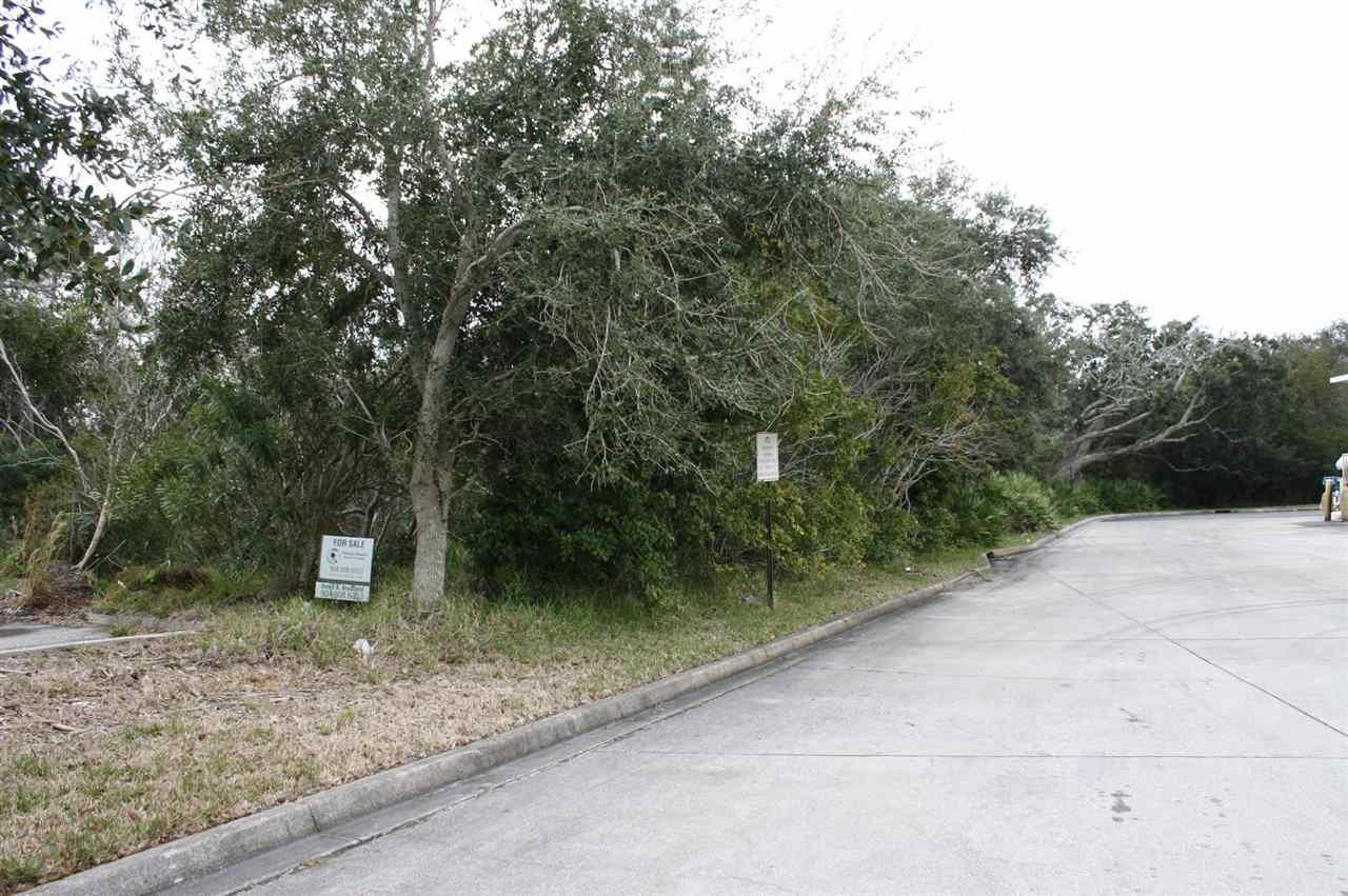 216 North Ocean Trace Road St. Augustine, FL 32080 - Photo 2 of 4 a view of a road with a trees