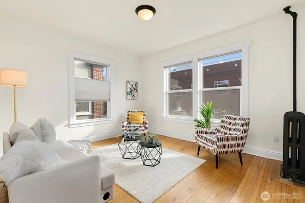 a living room with furniture and a table