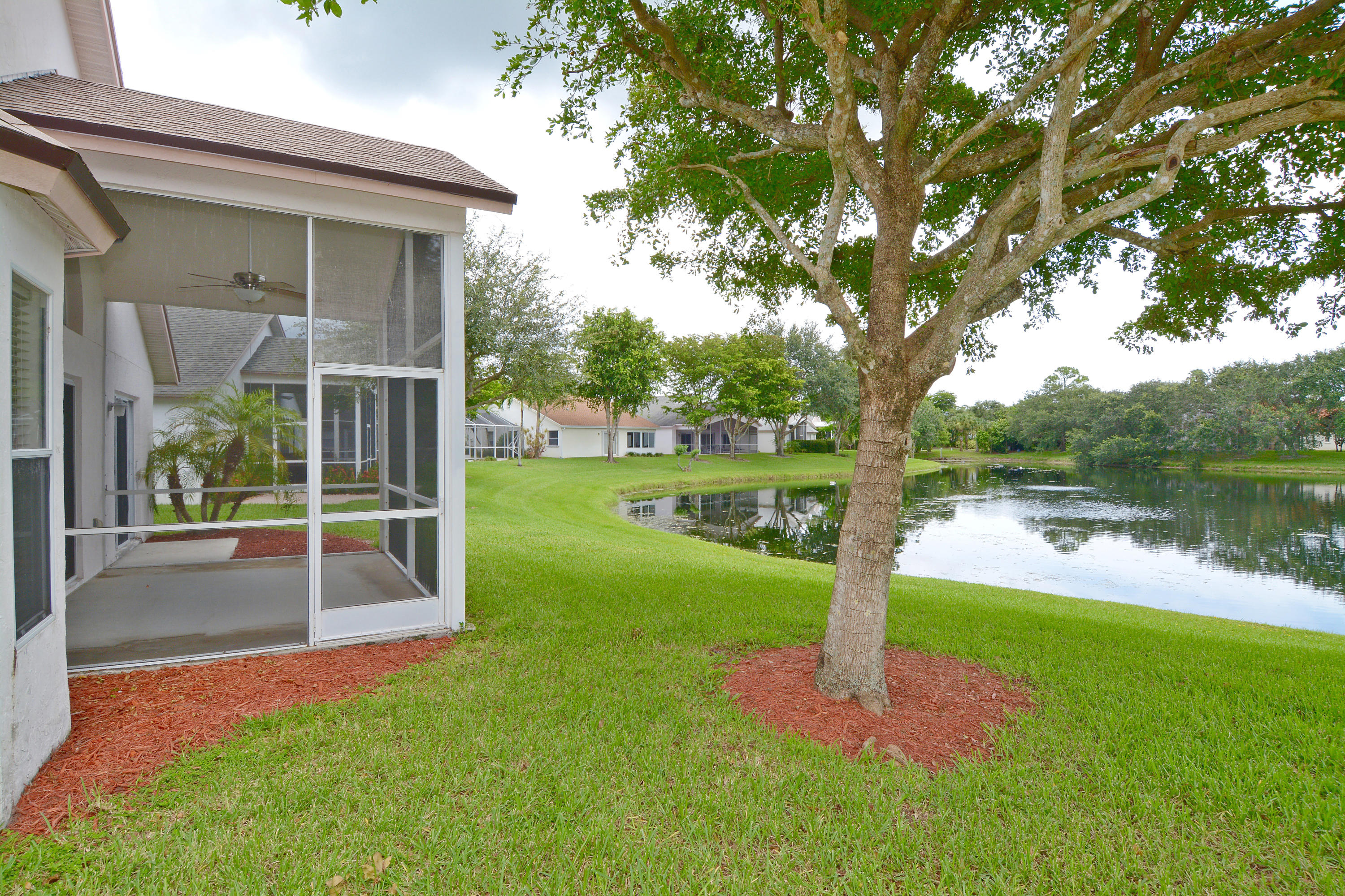 433 Trotters Lane Greenacres, FL 33413 - Photo 4 of 20 Patio and lake
