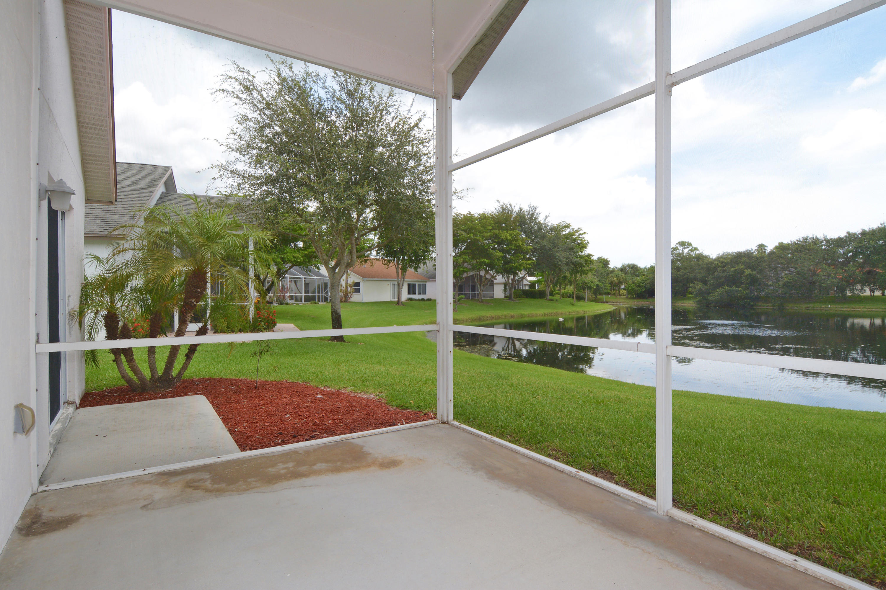 433 Trotters Lane Greenacres, FL 33413 - Photo 5 of 20 Screened covered patio