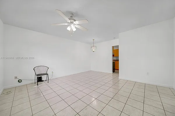 a view of an empty room and window