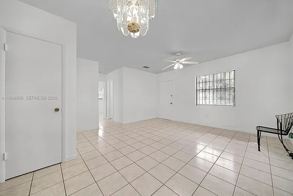 a view of an empty room and window