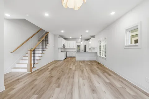 a view of entryway with wooden floor