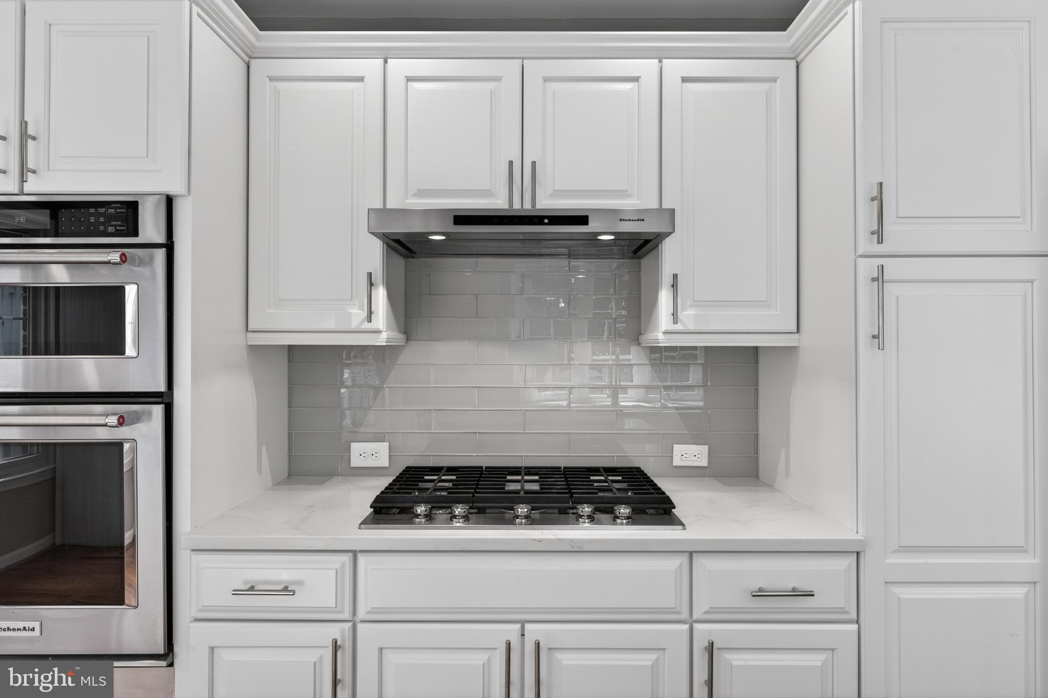 6 Nearfield Road Lutherville-Timonium, MD 21093 - Photo 21 of 71 a stove top oven sitting inside of a kitchen