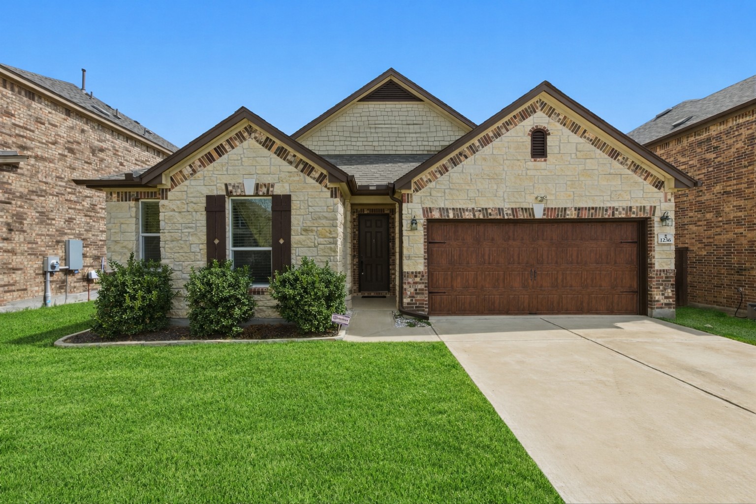 1236 Cornith Lane Leander, TX 78641 - Photo 1 of 32 a front view of a house with a yard and garage