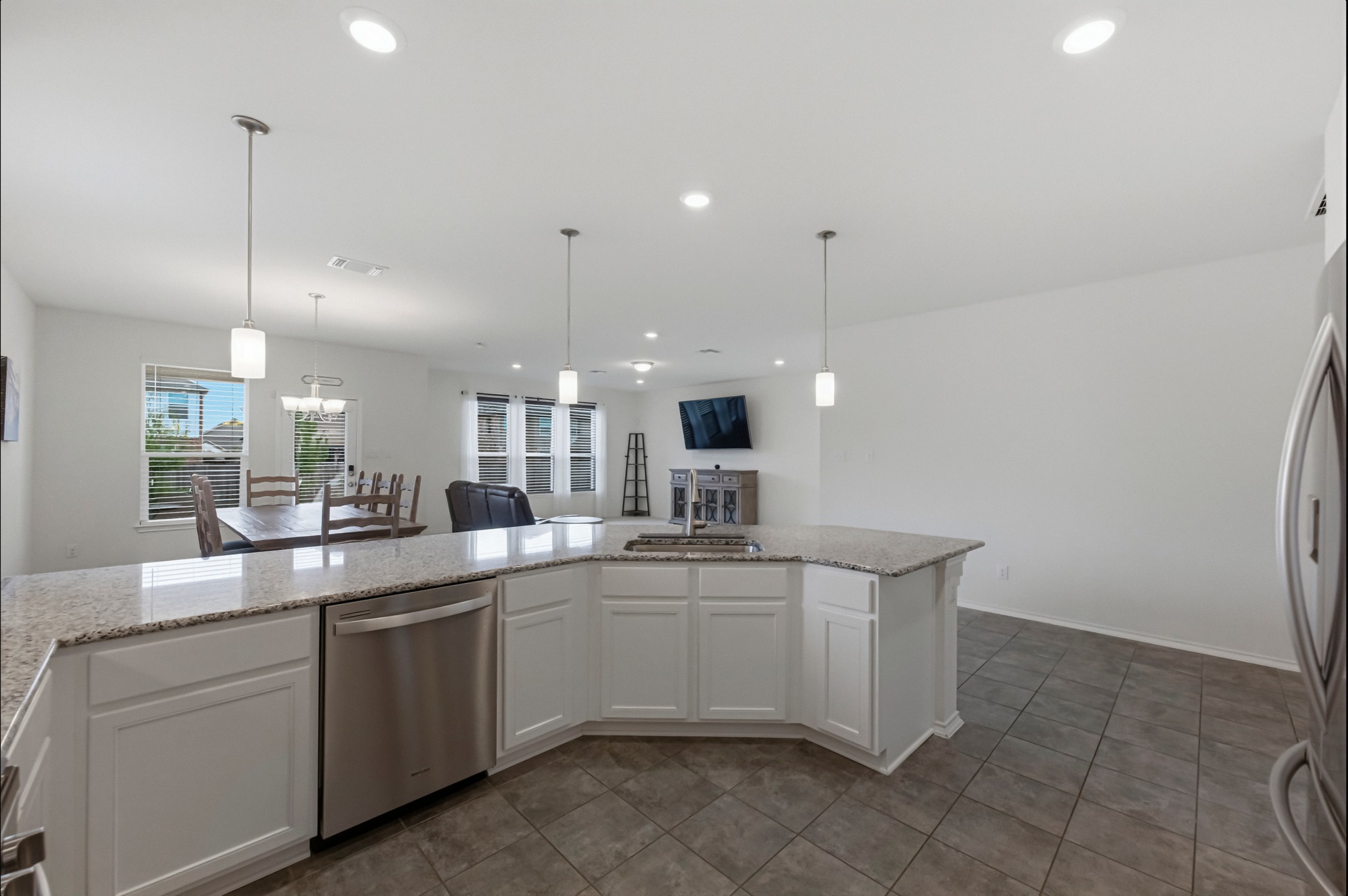 1236 Cornith Lane Leander, TX 78641 - Photo 11 of 32 a kitchen with a sink and cabinets