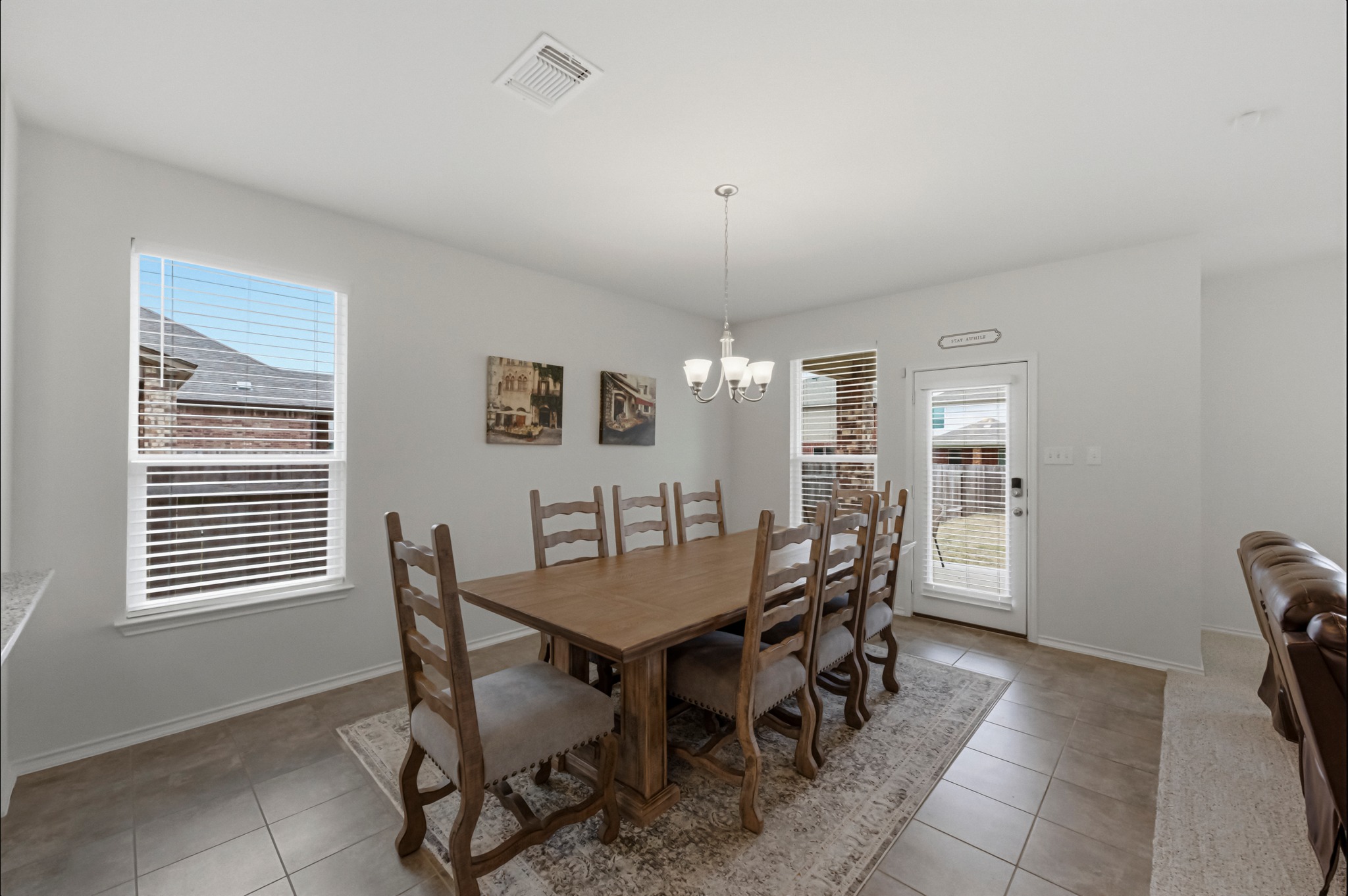 1236 Cornith Lane Leander, TX 78641 - Photo 15 of 32 a view of a dining room with furniture and window