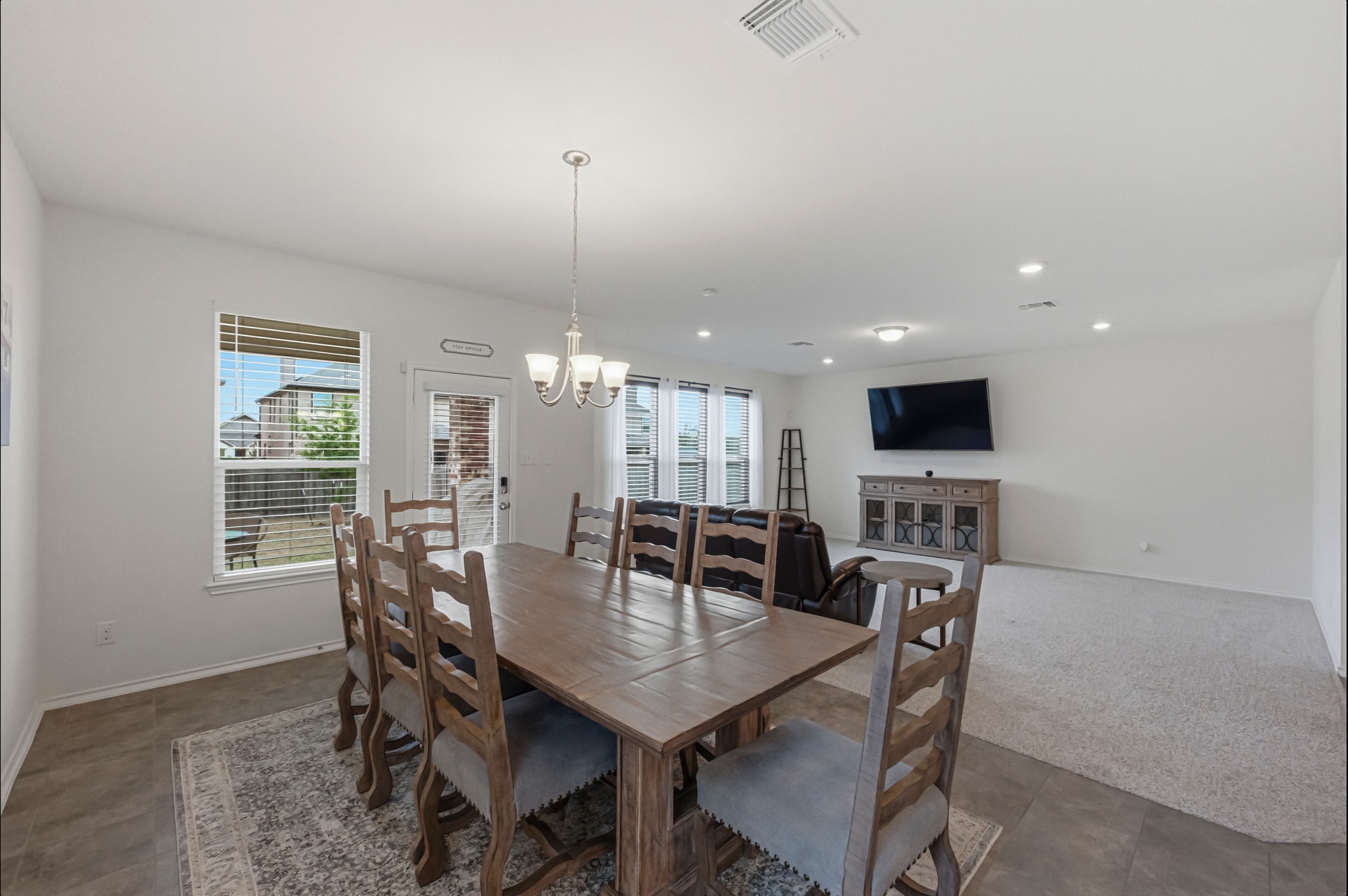 1236 Cornith Lane Leander, TX 78641 - Photo 16 of 32 a dining room with furniture and window