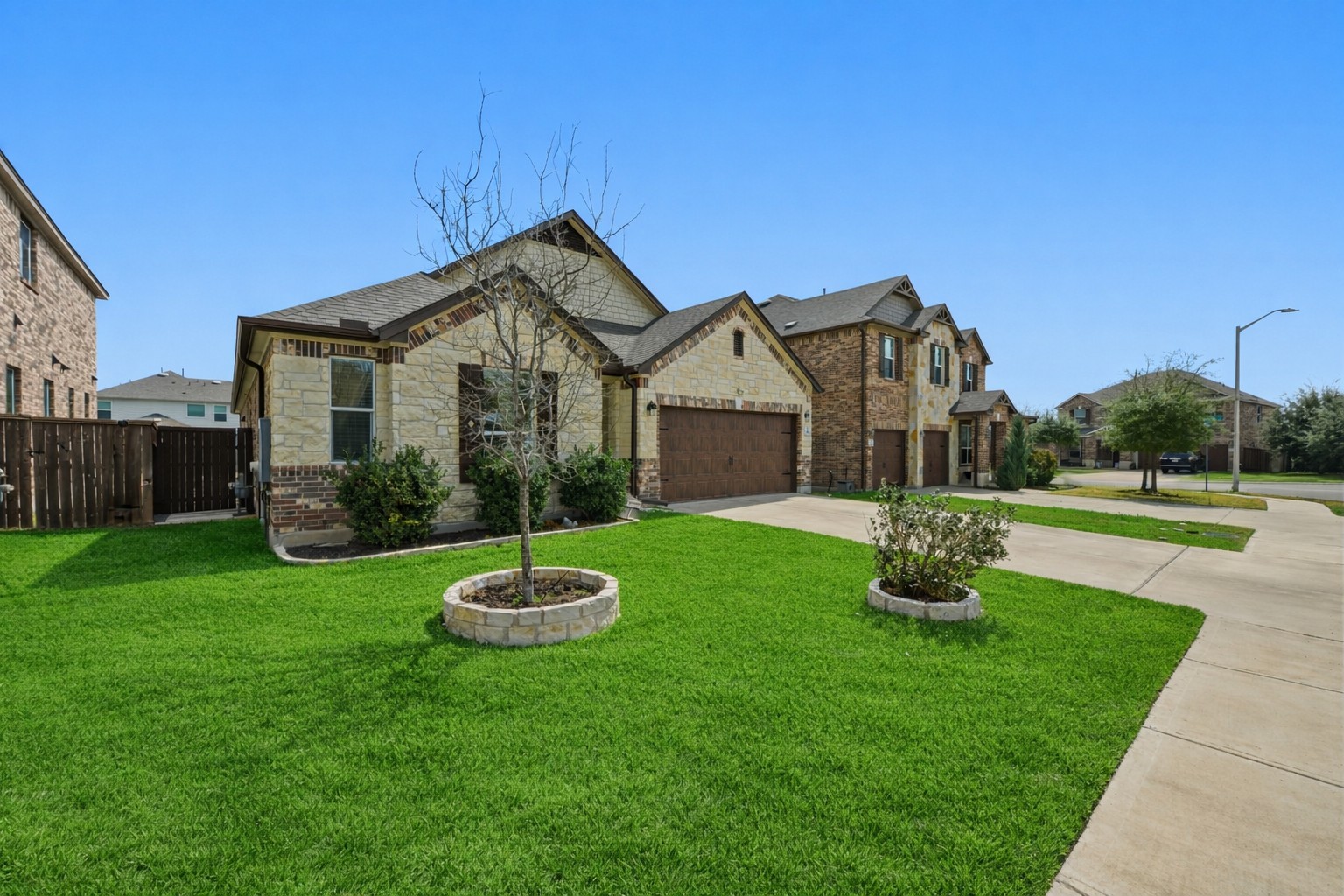 1236 Cornith Lane Leander, TX 78641 - Photo 2 of 32 a front view of a house with a yard