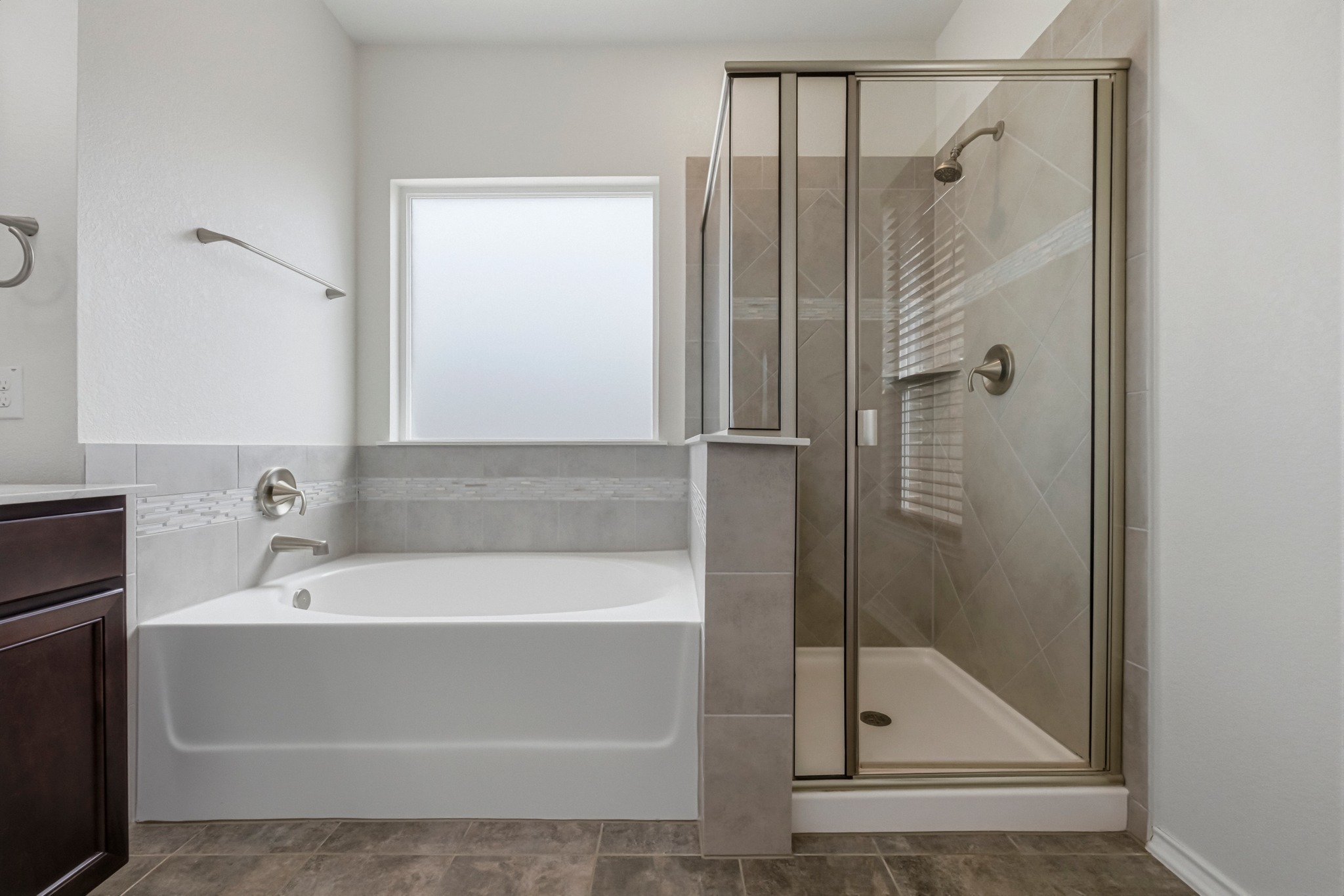 1236 Cornith Lane Leander, TX 78641 - Photo 21 of 32 a bathroom with a bathtub and a shower