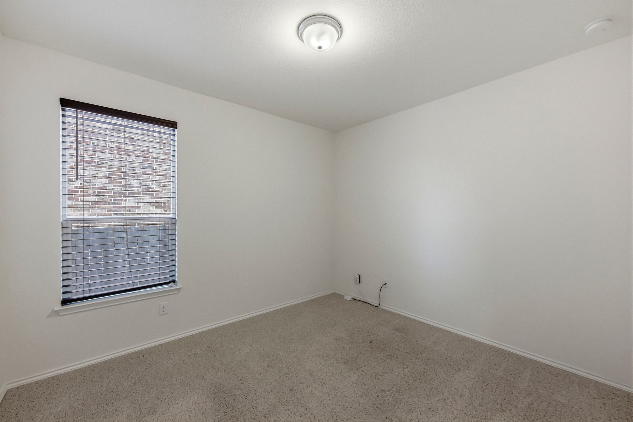 1236 Cornith Lane Leander, TX 78641 - Photo 23 of 32 an empty room with a window