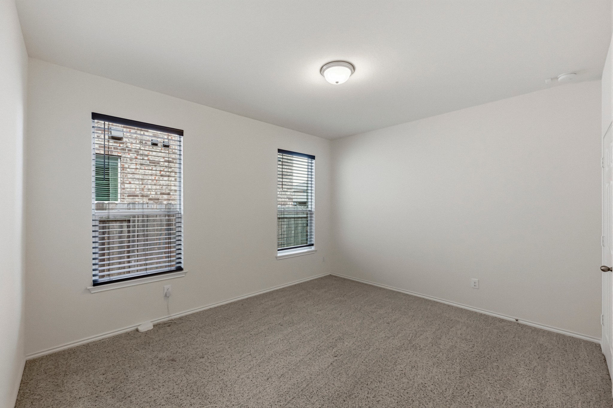 1236 Cornith Lane Leander, TX 78641 - Photo 25 of 32 an empty room with windows