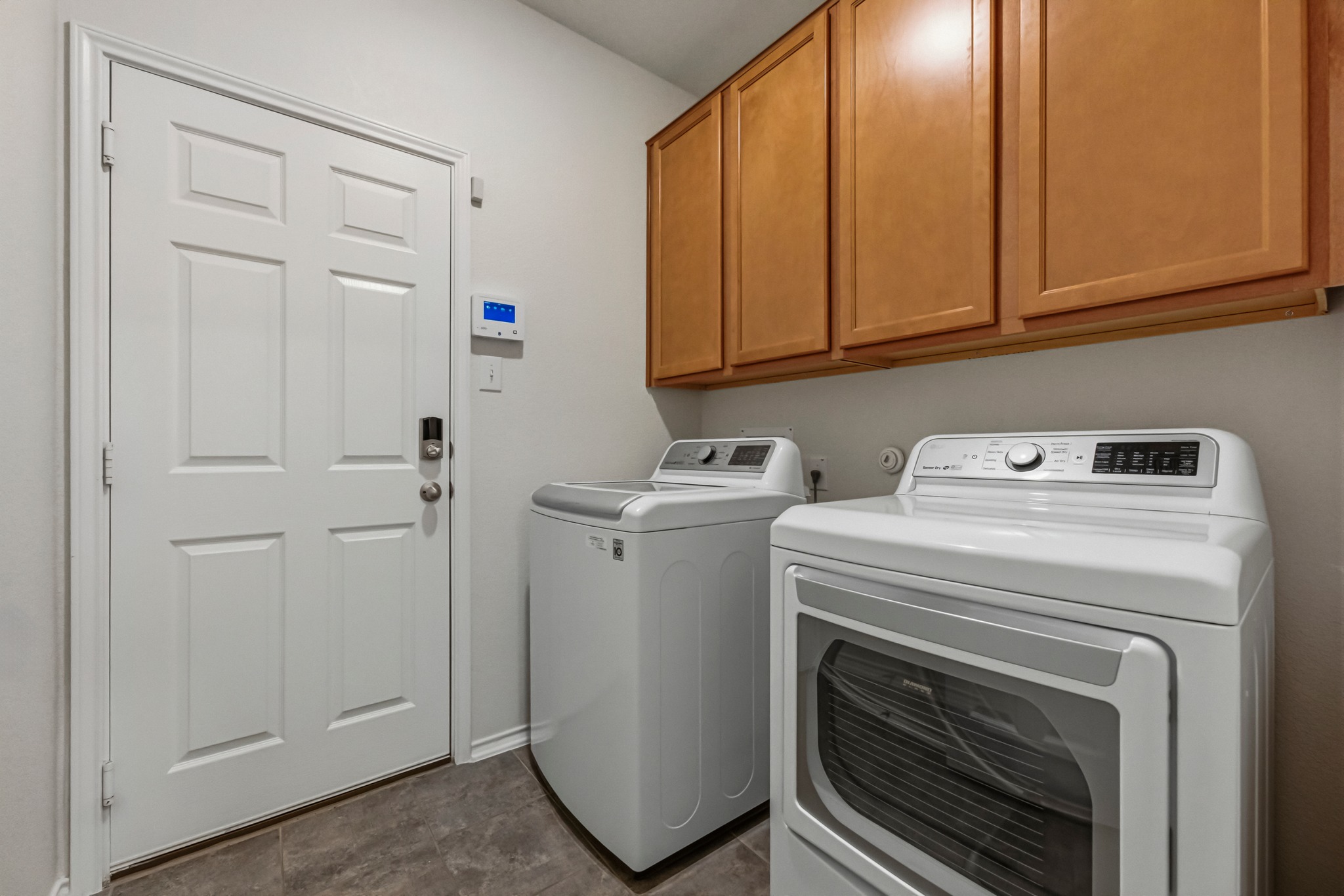 1236 Cornith Lane Leander, TX 78641 - Photo 27 of 32 a utility room with dryer and washer