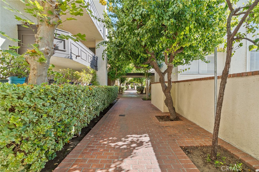 5440 Lindley Avenue, Unit 201 Encino, CA 91316 - Photo 28 of 38 a view of a pathway of a park