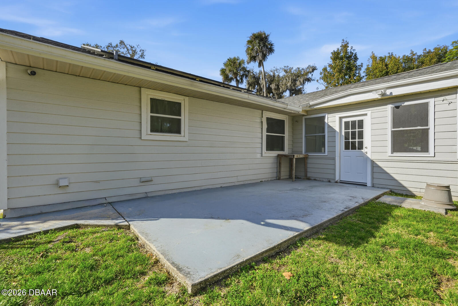 550 Locust Street Port Orange, FL 32127 - Photo 27 of 37 a view of backyard with a garden and plants