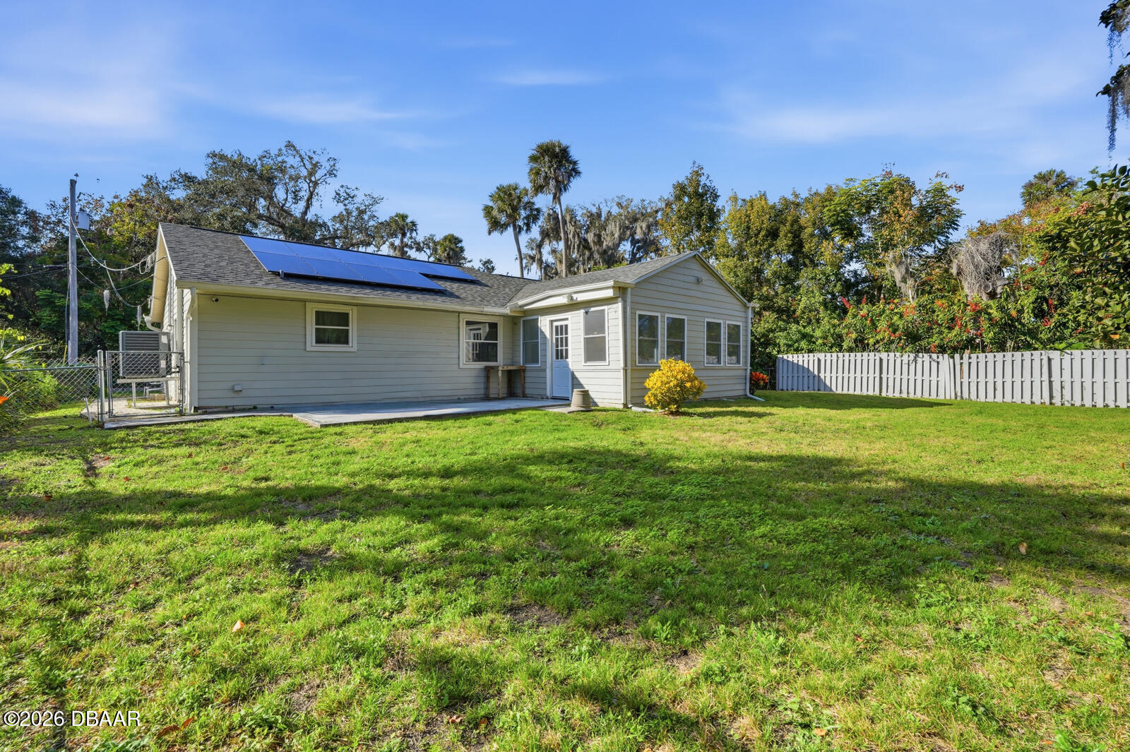 550 Locust Street Port Orange, FL 32127 - Photo 28 of 37 a front view of house with yard and green space