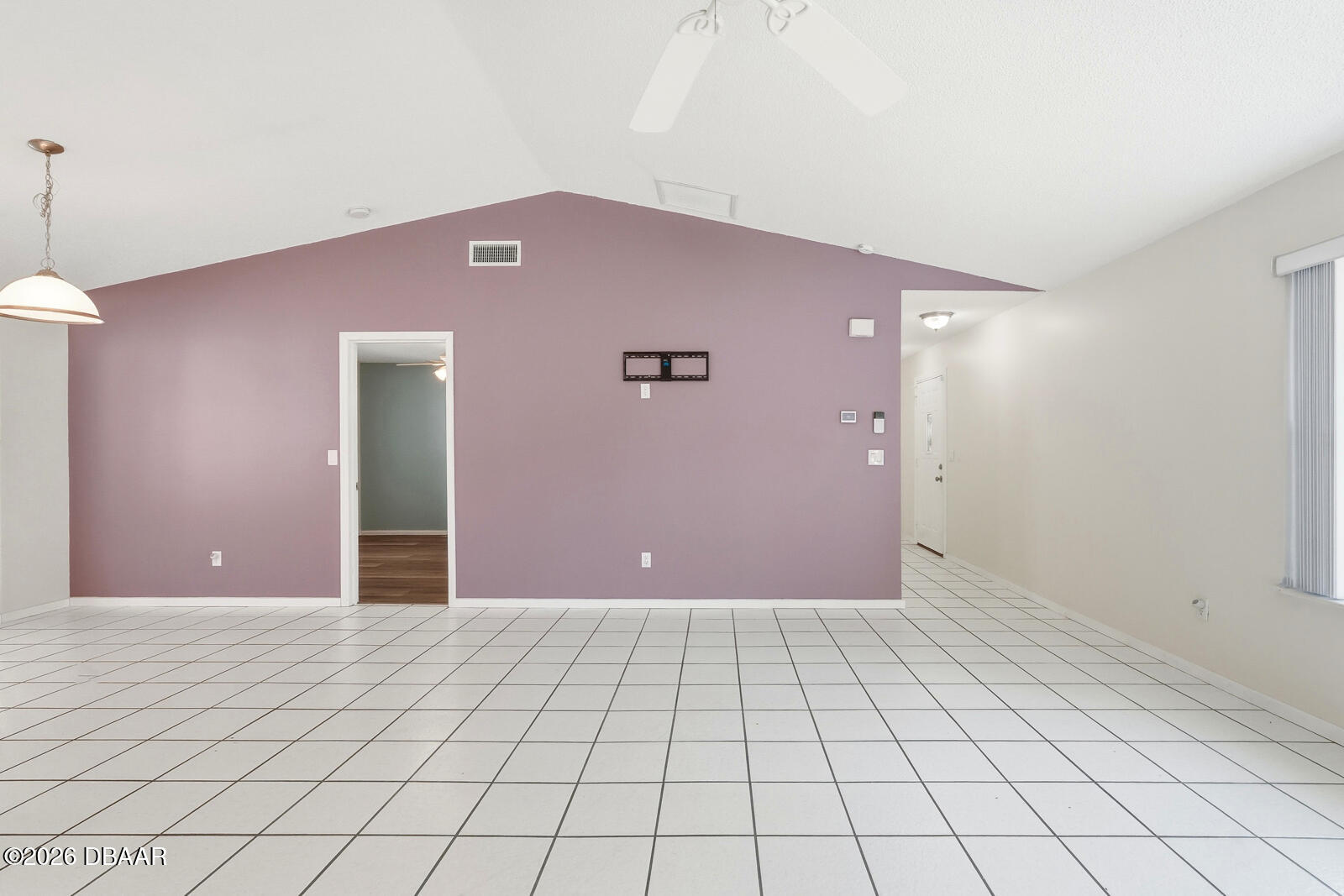 550 Locust Street Port Orange, FL 32127 - Photo 7 of 37 a view of a livingroom with a rug