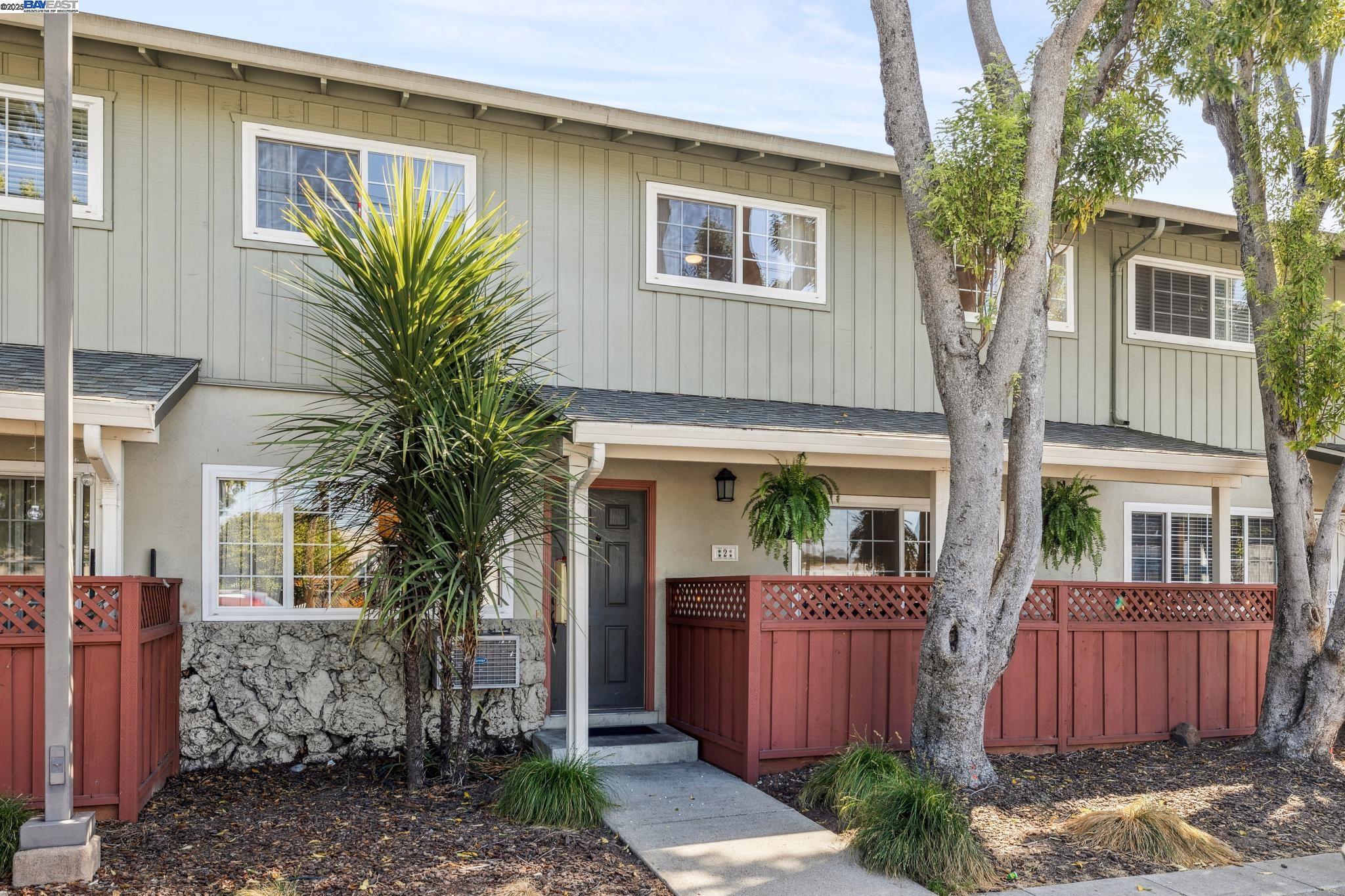 700 Fargo Avenue, Unit 2 San Leandro, CA 94579 - Photo 1 of 39 a front view of a house with a garden
